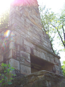 There used to be a building around this chimney, but it's long gone. The chimney is all that's left.