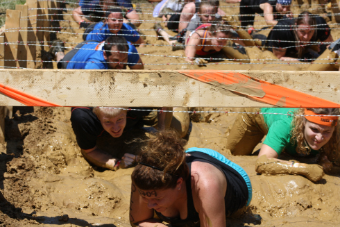 Kiss of Mud - Crawling through the mud under some barbed wire--always a good time.